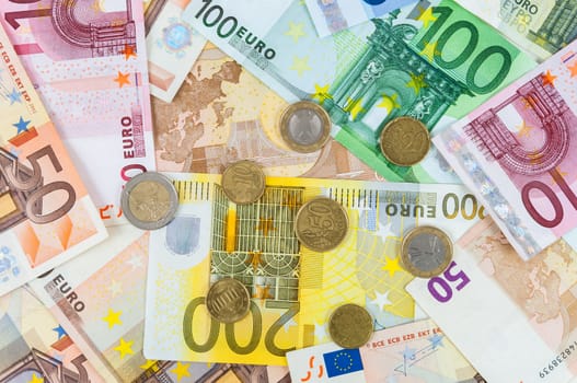 Background made of euro banknotes and coins