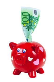 Piggy bank and 100 euro banknote isolated on white background with clipping path