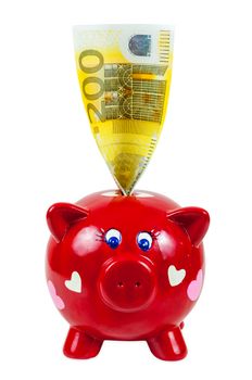 Piggy bank and 200 euro banknote isolated on white background with clipping path