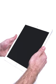 Tablet in men’s hands isolated on a white background