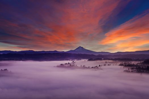 Mount Hood Over Sandy River Covered in thick blanket of fog at Sunrise