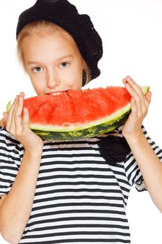 Cute girl eating red juicy watermelon, isolated on white 