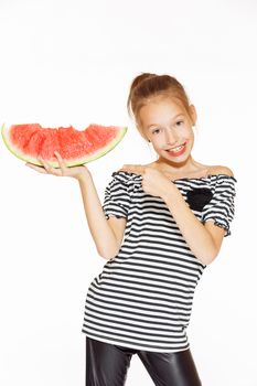 Cute girl eating red juicy watermelon, isolated on white 