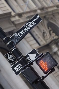 New York stock exchange street sign and red trafic light on a semaphore in New York City, USA. Do not invest at the moment. Bear market ahead.