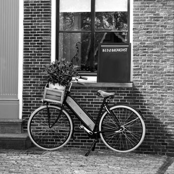 Flower bicycle in front of a Bed and Breakfast, Europe