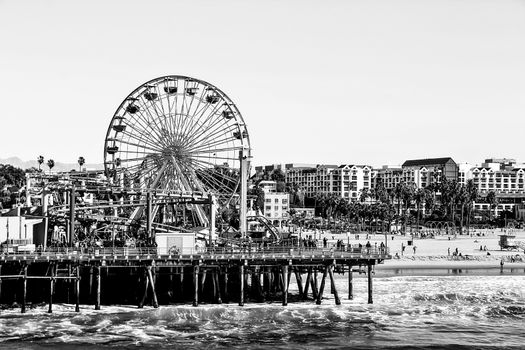 ferris wheel with beach view at Santa Monica, California, USA in black and white