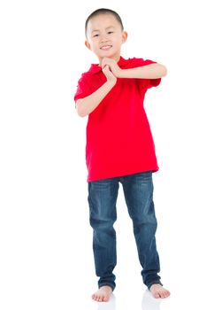 Chinese young boy blessing, isolated on white background