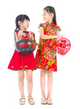  Asian Chinese girls decorating for Chinese new year