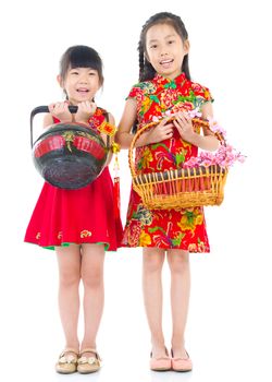  Asian Chinese girls decorating for Chinese new year