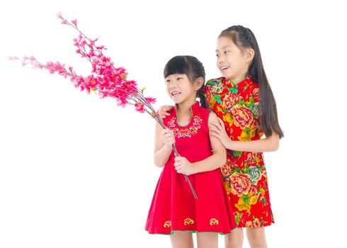  Asian Chinese girls decorating for Chinese new year