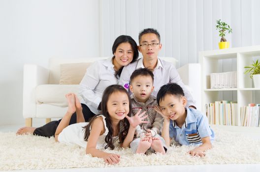 Indoor portrait of asian family