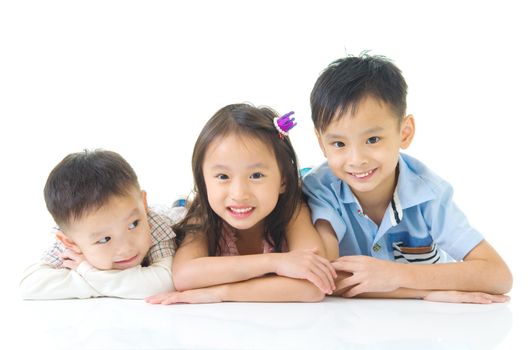 Asian kids lying on the floor