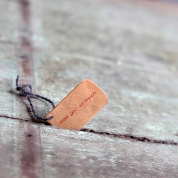 Sad background in love, with message on paper as: you make me hurt, a lonesome and despair concept