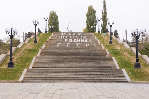 Volgograd, Russia - November 5, 2015: view of the entrance area and stairs with the inscription "For Our Soviet Motherland USSR," going to the mall poplars historical memorial complex "To Heroes of the Battle of Stalingrad", Volgograd