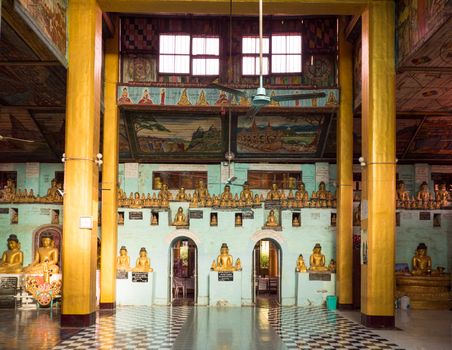 Interior with dozens of Buddha images at the Shite-thaung Temple in Mrauk-U, Rakhine State, Myanmar