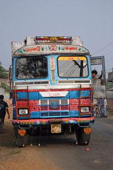 Typical, colorful, decorated public transportation bus in Kumrokhali, West Bengal, India, January 12, 2009.