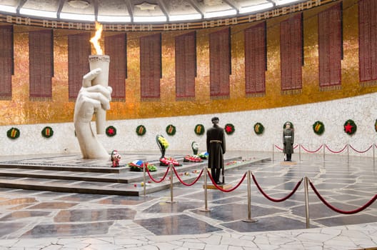 Volgograd, Russia - November 5, 2015: View of the Hall of Military Glory, honor guard and the eternal flame in the historical-memorial complex "To Heroes of the Battle of Stalingrad," Mamayev Kurgan, Volgograd