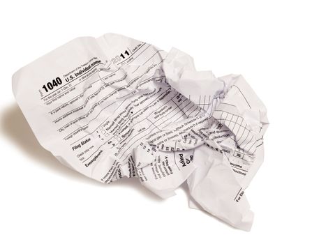 Frustration shown with crumpled tax form.  On white background