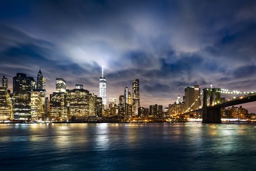 New York City - beautiful sunrise over manhattan with manhattan and brooklyn bridge USA