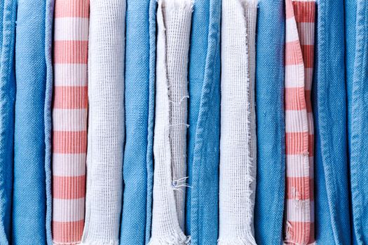 Assorted Newly Washed Rolled School Rugs, Arranged in Vertical Positions, for a Conceptual Background