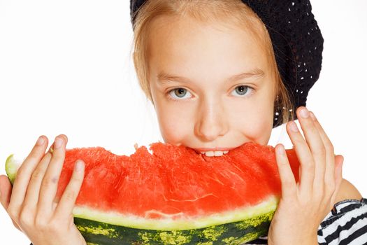 Cute girl eating red juicy watermelon, isolated on white 