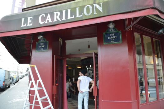 FRANCE, Paris: Le Carillon, the popular Paris located on rue Bichat, bar where 15 people were killed during terror attacks in November, reopens its doors again on January 13, 2016, two months after the attacks. Gunmen and suicide bombers went on a killing spree in Paris on November 13, attacking the concert hall Bataclan as well as bars, restaurants and the Stade de France. Islamic State jihadists operating out of Iraq and Syria released a statement claiming responsibility for the coordinated attacks that killed 130 and injured over 350.
