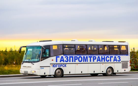 NOVYY URENGOY, RUSSIA - AUGUST 31, 2012: Interurban coach SOR LH10.5 Arktika at the city street.