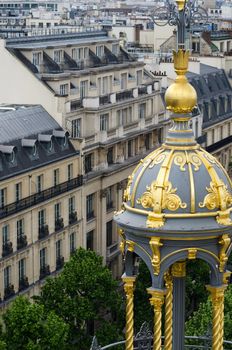 Roof Decorated with apartment in the background, Paris, France.