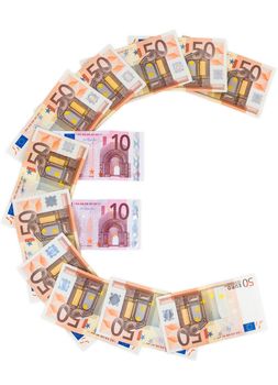 Euro symbol made of euro banknotes isolated on white background with clipping path