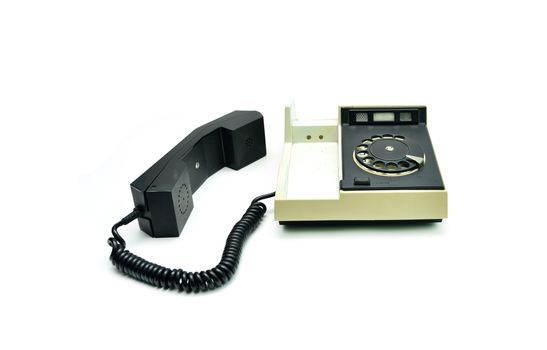 vintage old plastic phone over white background