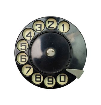 black vintage phone dial disk over white