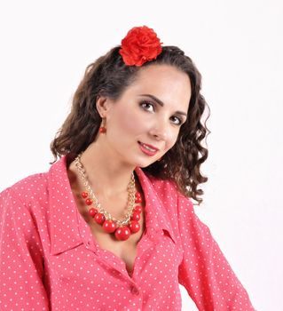 young girl with a red  necklace clasp and red on a white background