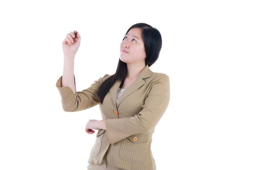 Closeup of young Asian business woman writing on transparent glassl.