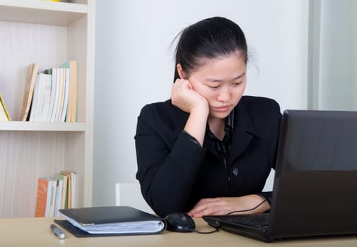 young business woman feel unhappy in the office