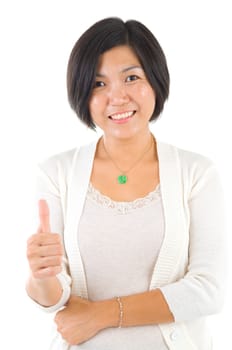 Asian female thumbs up with great smile.
