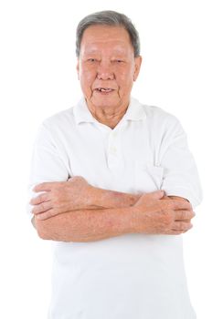 Confident arms crossed senior adult asian chinese man standing isolated white background
