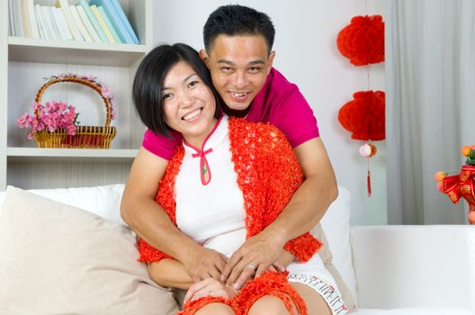 lovely chinese couple celebrating chinese new year