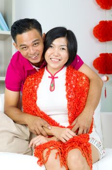 lovely chinese couple celebrating chinese new year