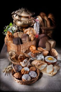Different kinds of bread on a canvas studio background
