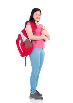 smiling young student girl standing and holding book