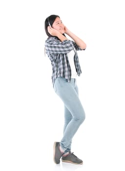 Young woman with headphones listening music