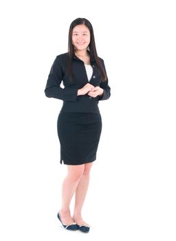 Full body Asian business woman standing on plain background.