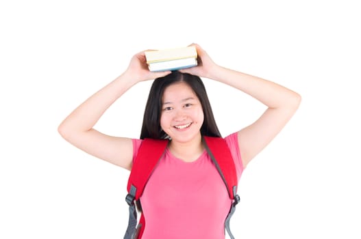 pretty university student girl holding book on the head