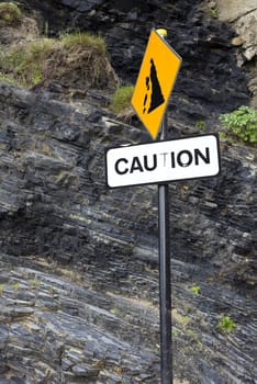 caution rock fall sign on Ballybunion beach in county Kerry Ireland