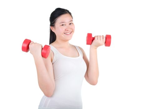 happy young woman exercising with dumbbells