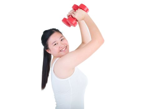 happy young woman exercising with dumbbells