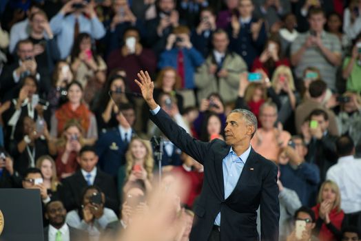UNITED STATES, Omaha: President Obama greets the crowd after his speech at UNO's Baxter Arena in Omaha, Nebraska on January 13, 2016, one day after his final State of the Union address.