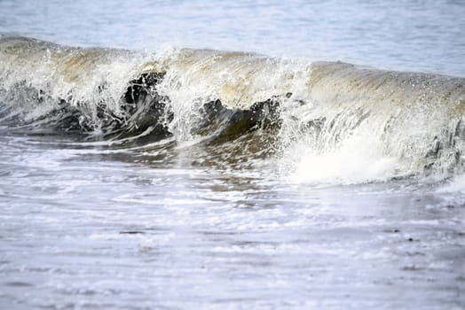 crisp waves lashing onto ballybunion beach in county kerry ireland