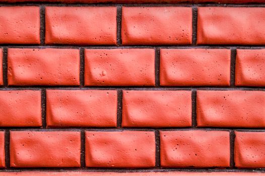 Brick background and wall from a red brick