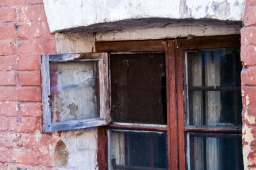 open window in the old house a summer day